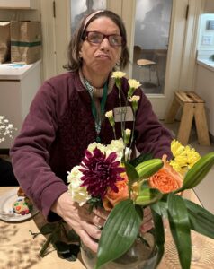 Woman holding a bouquet of flowers